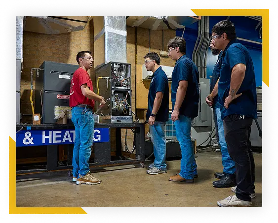 electrical students with instructor